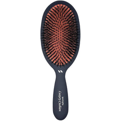 Spornette boar bristle brush close-up shows detangling action and added shine for all hair types