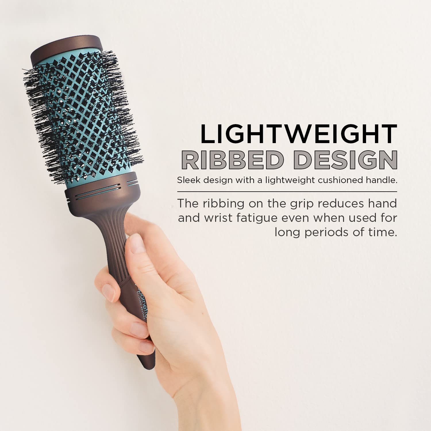 Spornette Ion Fusion round brush detangles long hair without snagging.