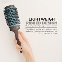 Spornette Ion Fusion round brush detangles long hair without snagging.