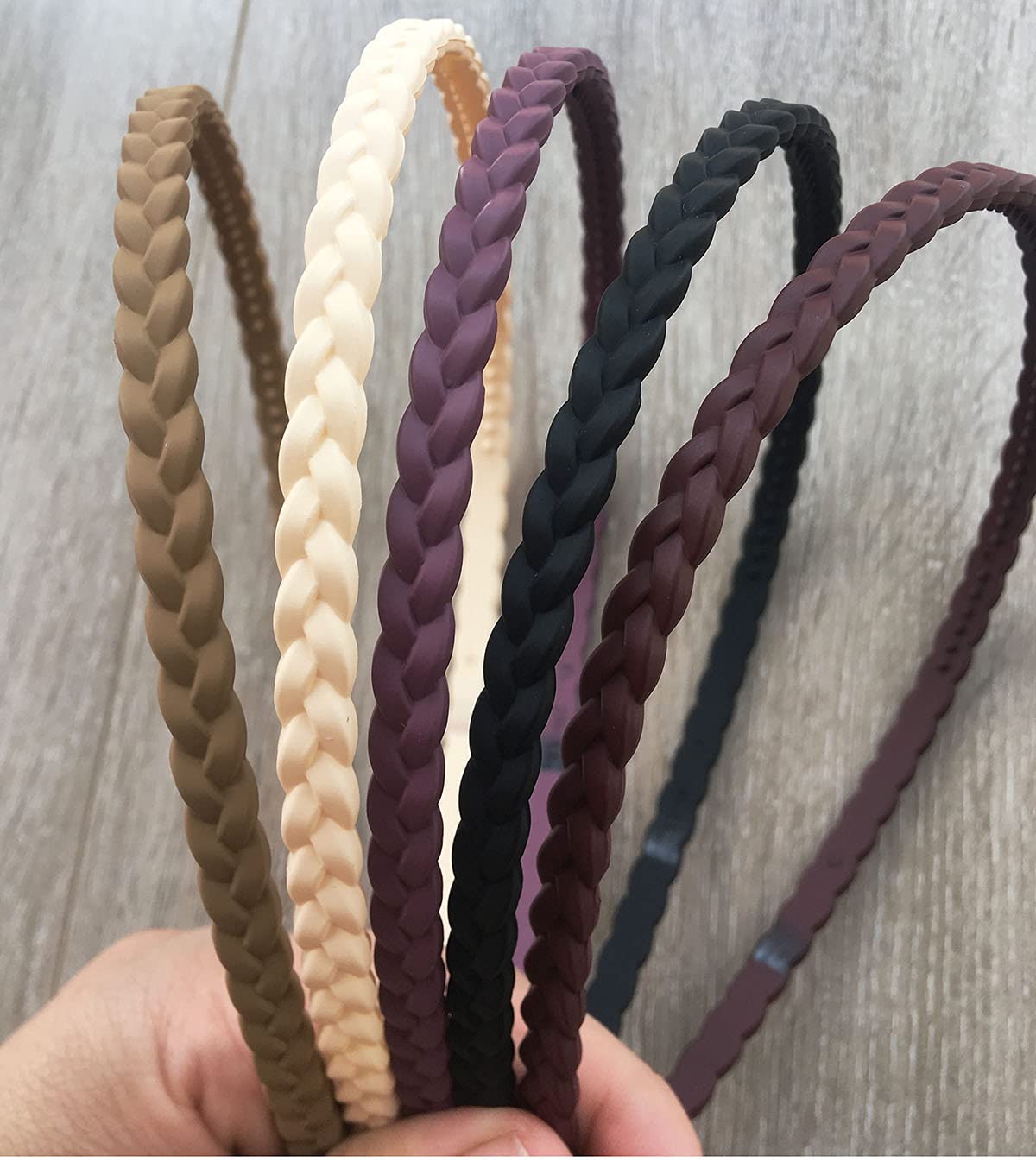 Springtime classic headband keeps hair back during routines and smiles.