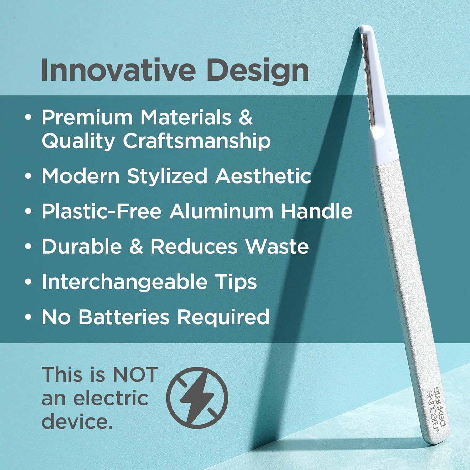 StackedSkincare dermaplaning tool with replaceable blade for peach fuzz removal and smoother skin.