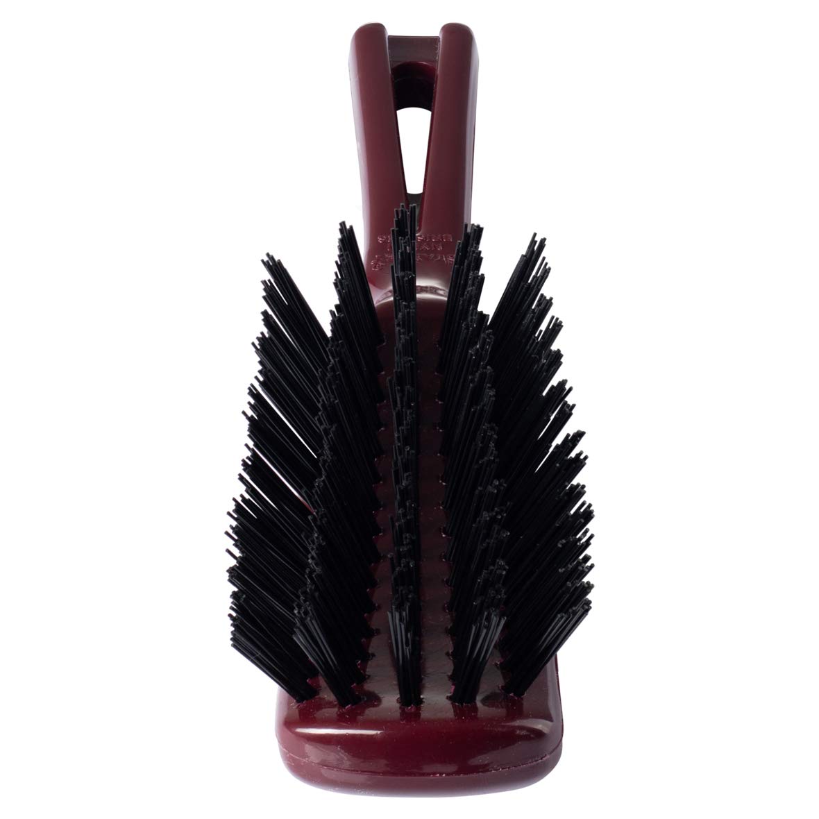 Stanley Commander hairbrush demonstrates scalp massage action during brushing.
