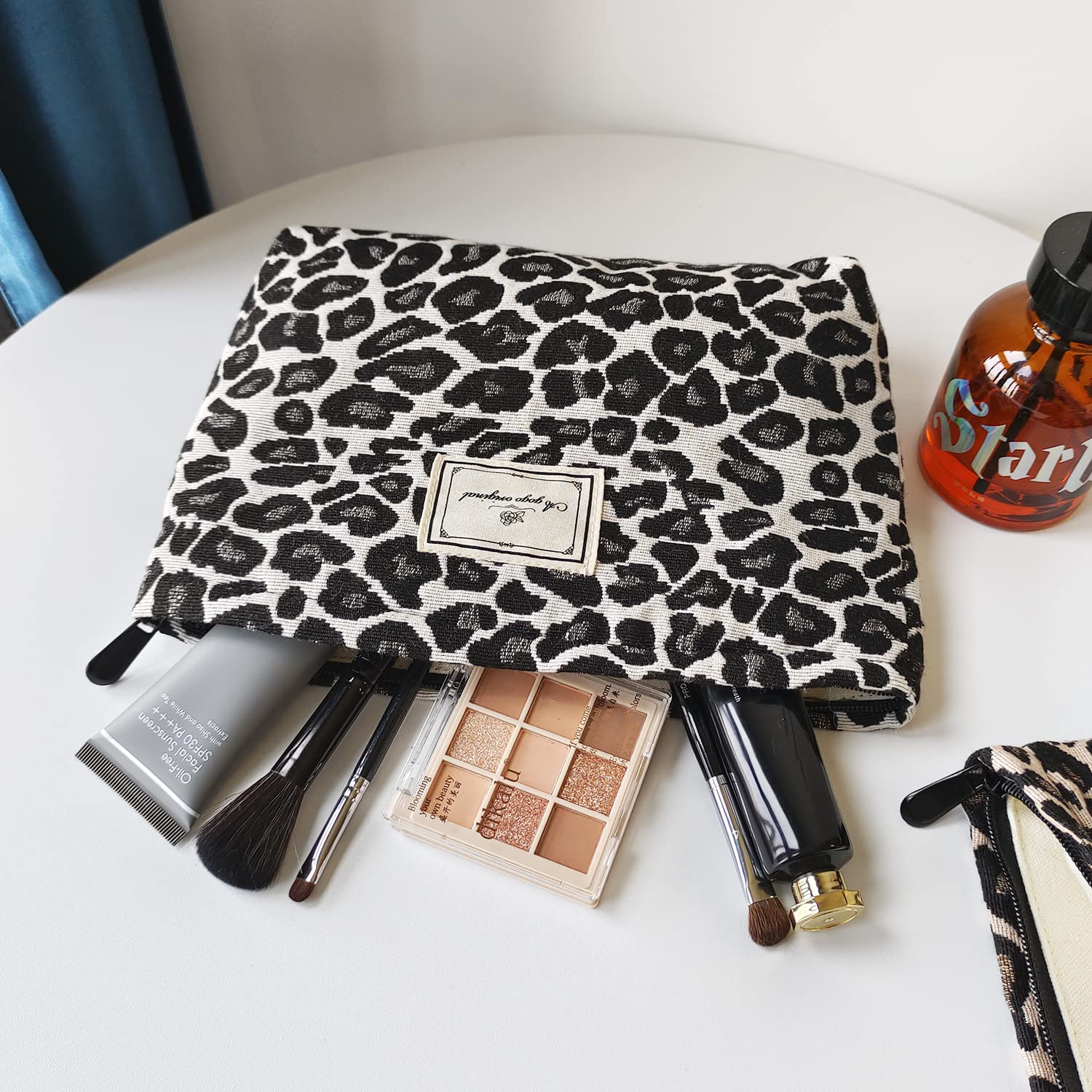 STARDW Leopard Makeup Bag open-top design provides easy access to essentials.