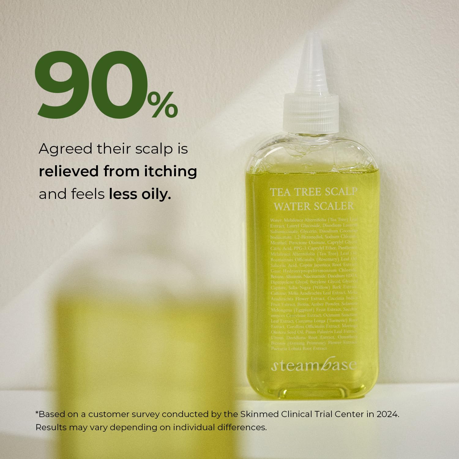 STEAMBASE Tea Tree Scalp Treatment application scene showing scalp massage for deep cleansing