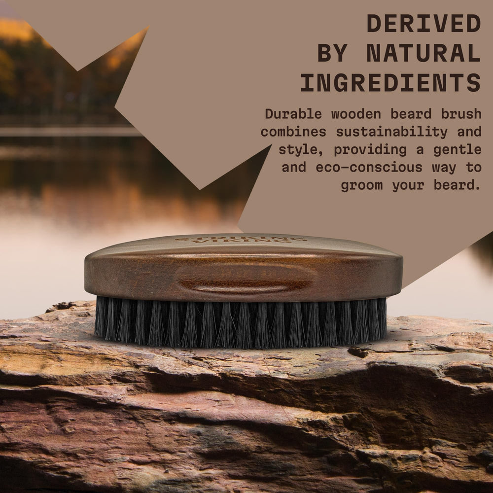 Striking Viking Beard Brush in hand for perfect grooming control.