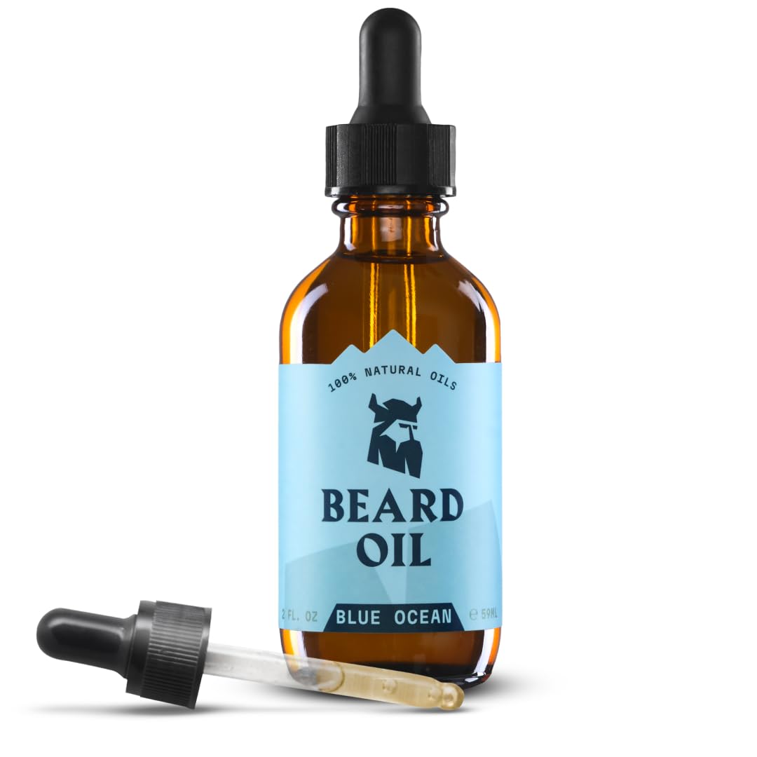 Striking Viking beard oil bottle in blue ocean theme promotes refreshed grooming.