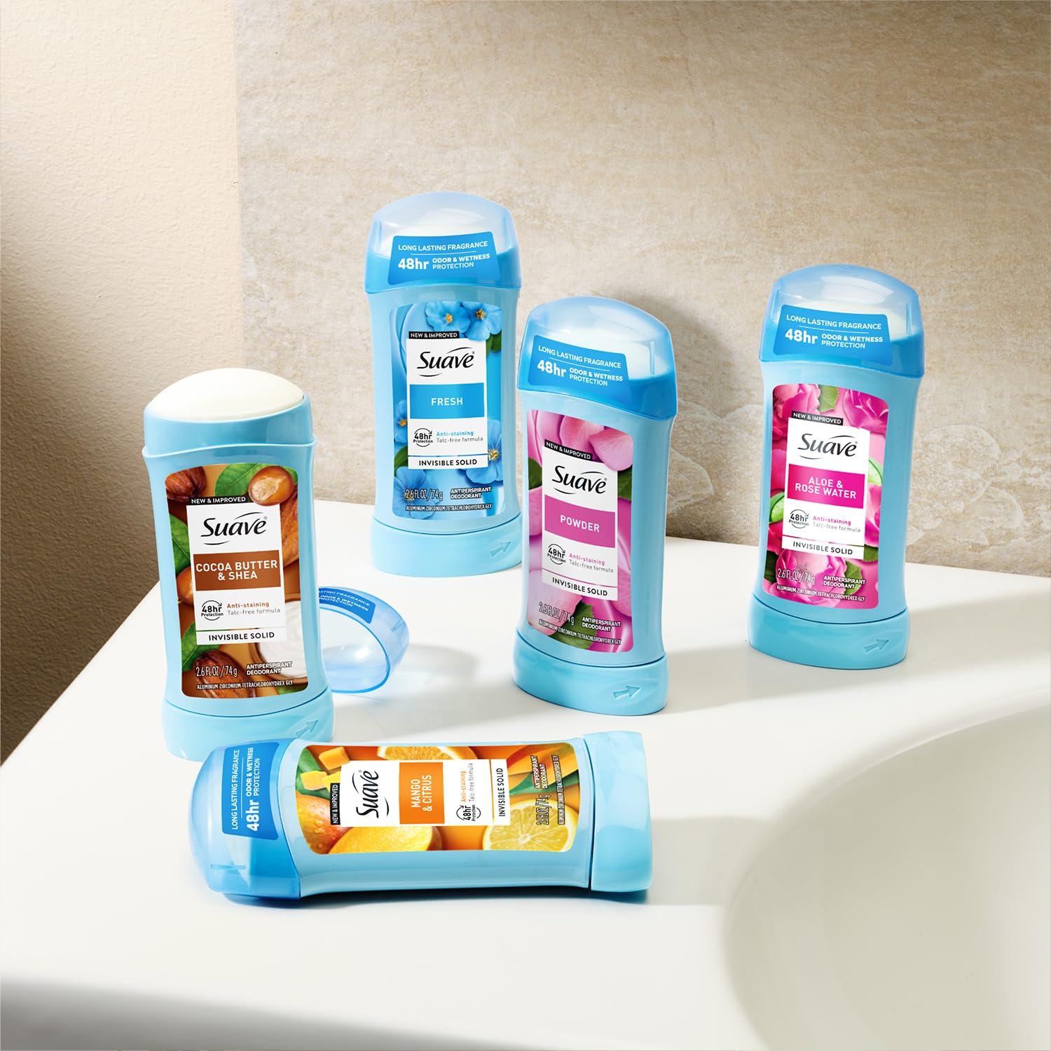 Suave antiperspirant women powder in closet scene for everyday use.