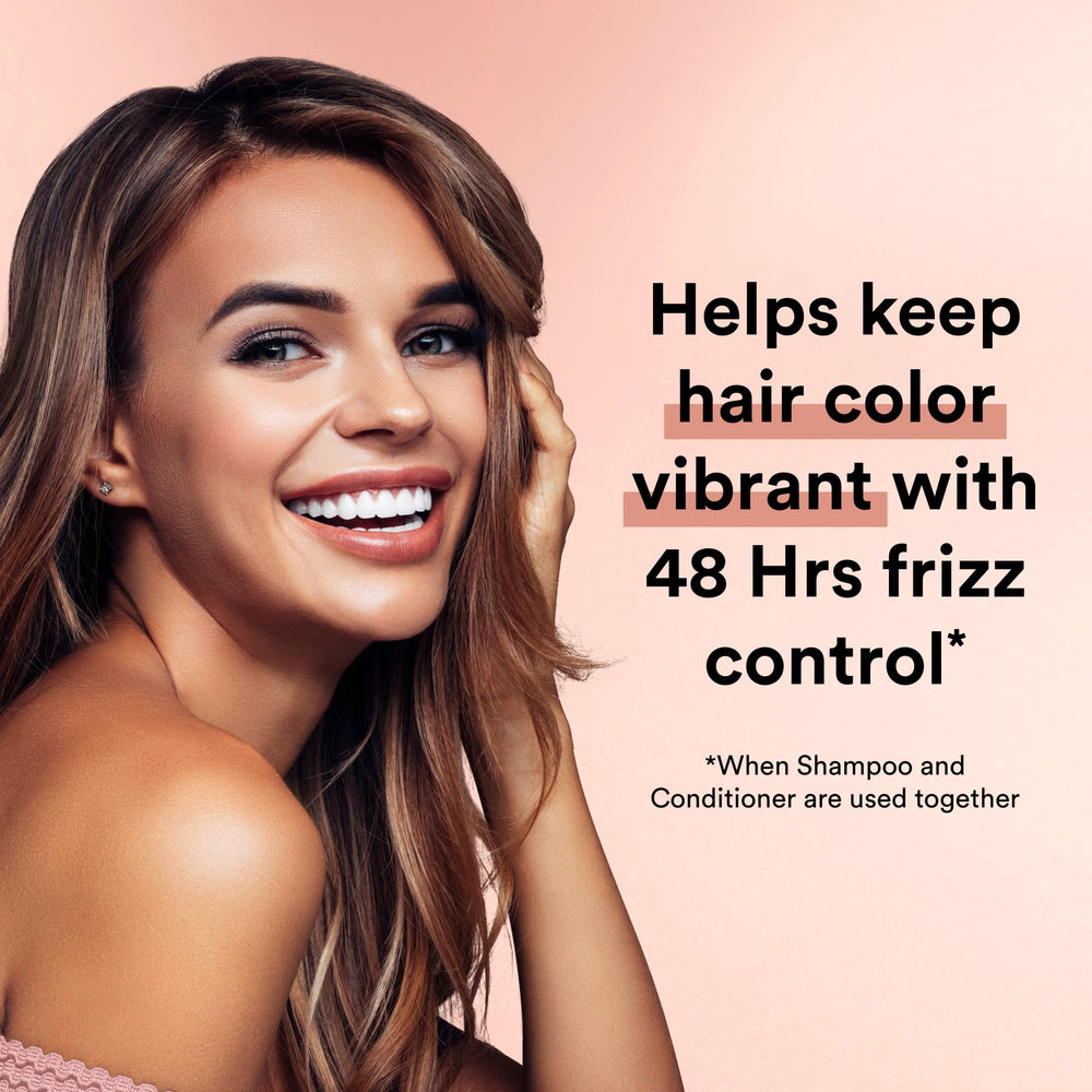 Suave Keratin Infusion Conditioner close-up emphasizes detangling hydration