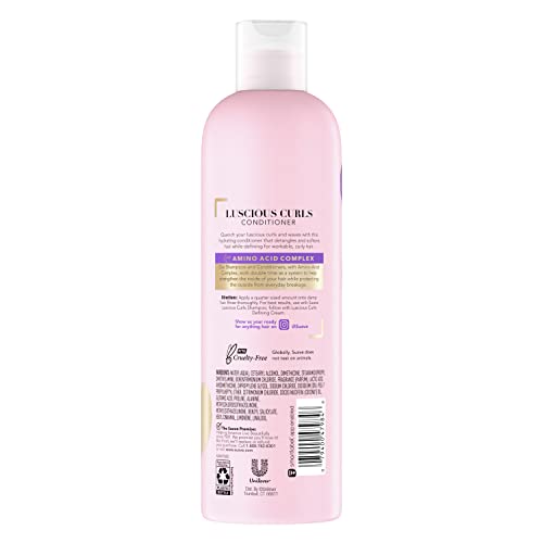 Suave Luscious Curls Conditioner curls-definition close-up for smoother, defined curls.