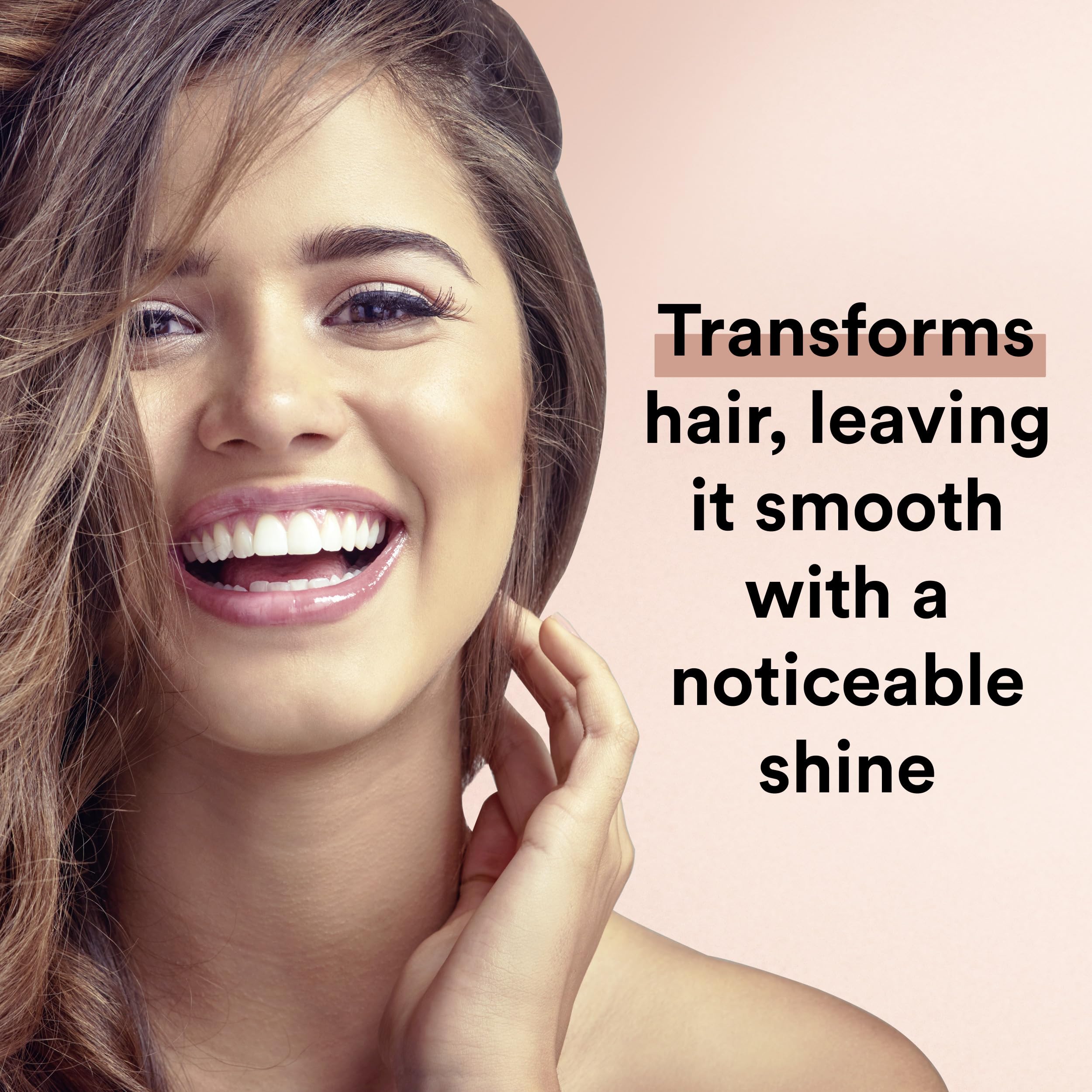 Suave Moroccan Oil Infusion Conditioner hair strand closeup shows frizz control and smoothness.