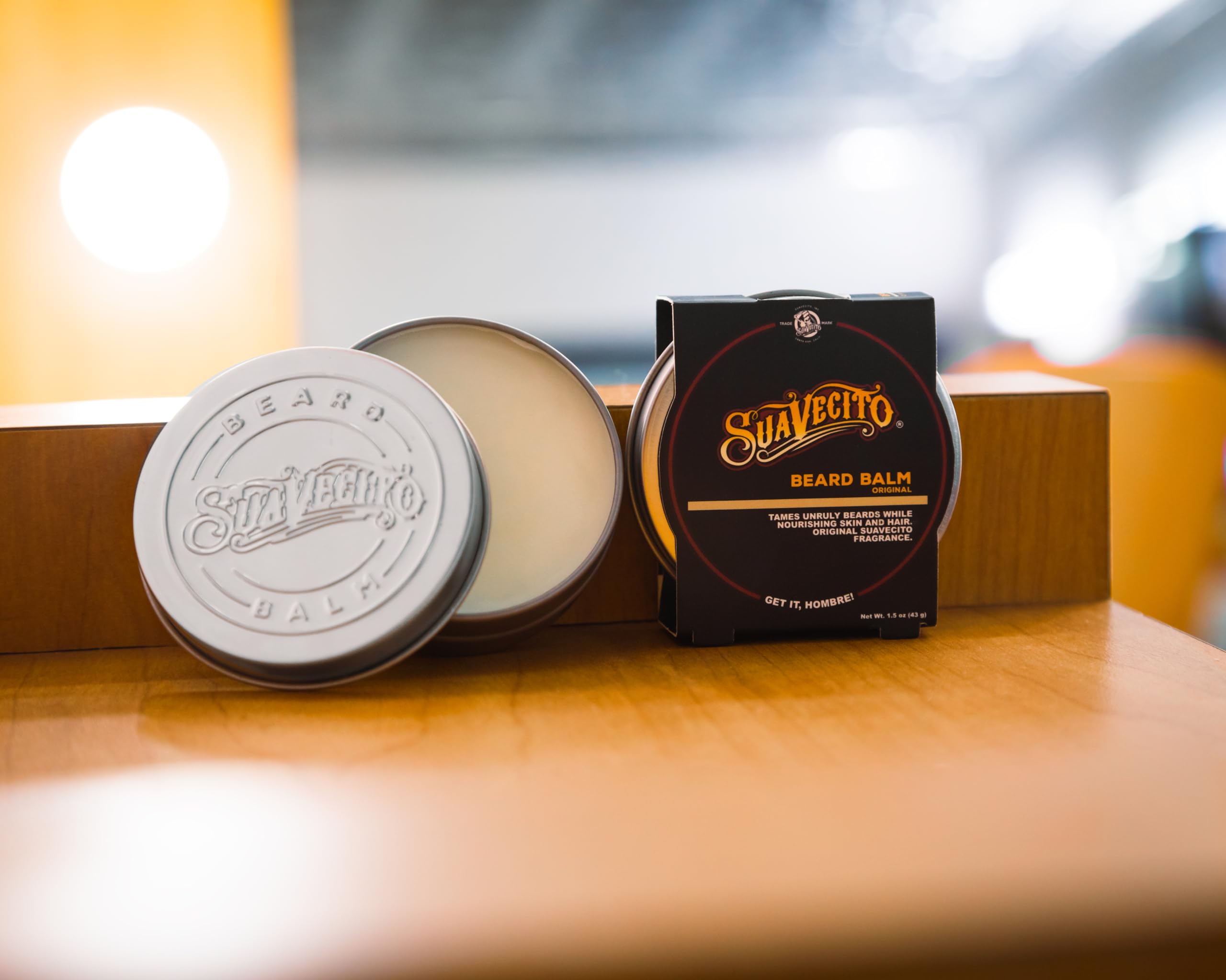 Suavecito beard balm being brushed through for even distribution