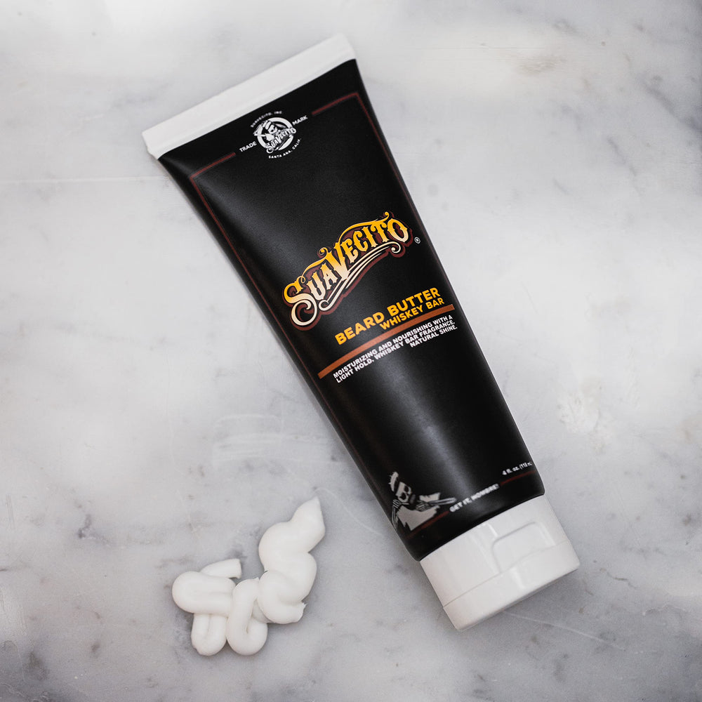 Suavecito Beard Butter Whiskey Bar packaging and 4 oz jar.
