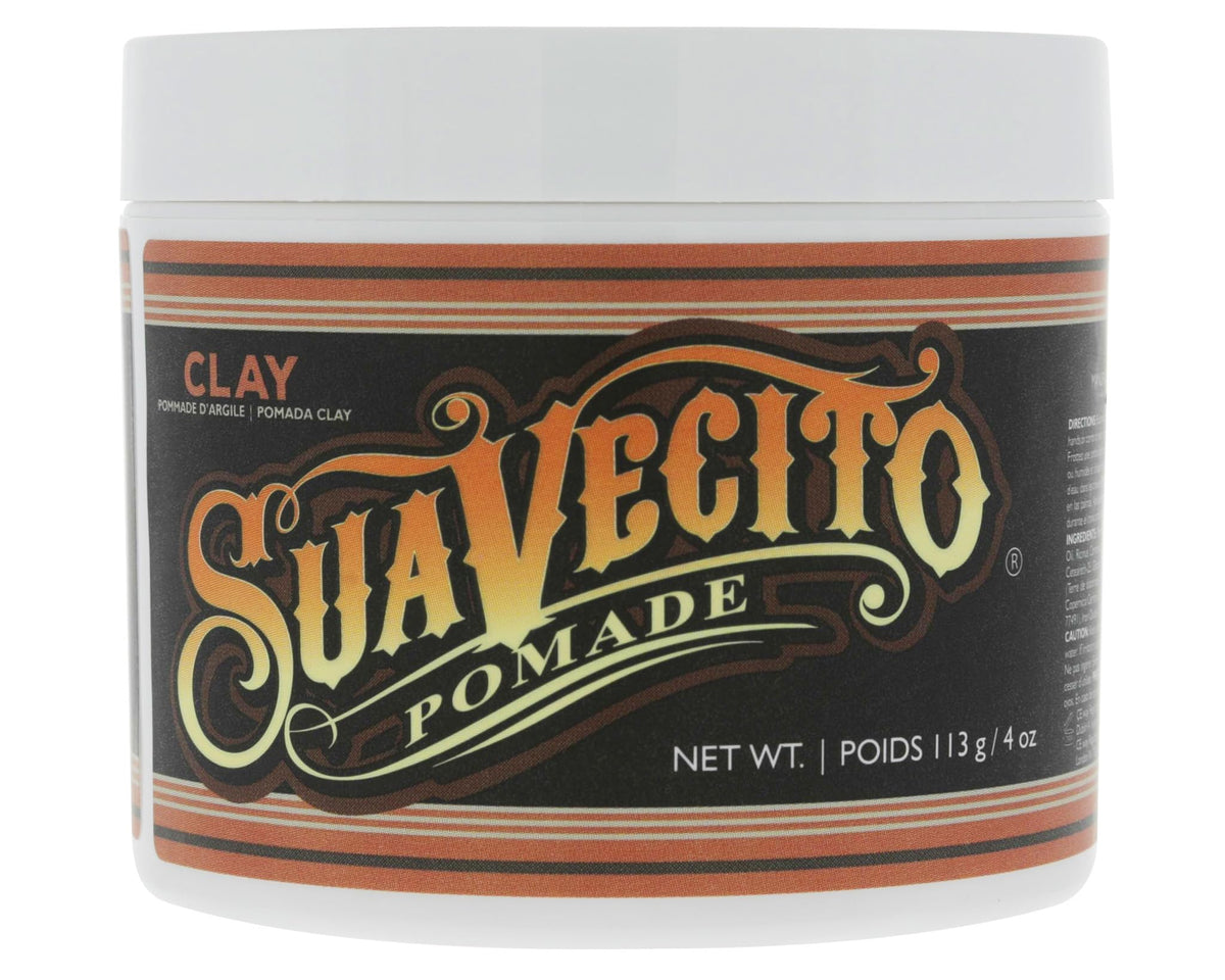Suavecito Firme Clay pomade application close-up for textured hold.