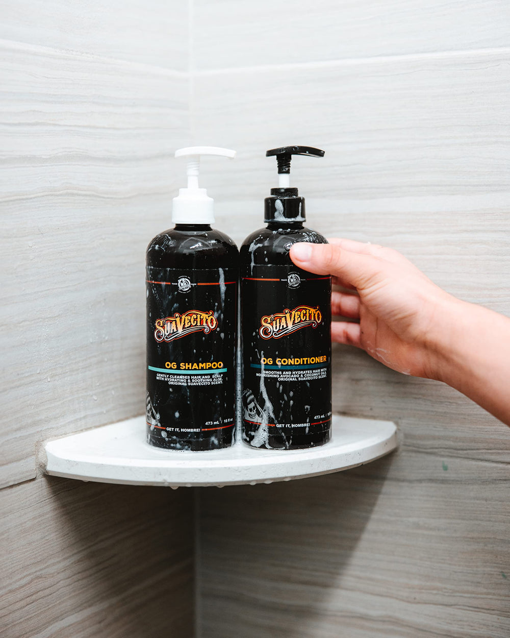 Suavecito OG set packaging highlights all-in-one care and signature scent.