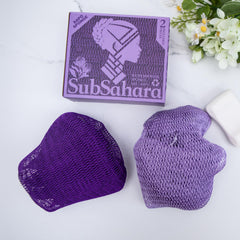 SubSahara net sponge in iavender purple demonstrates soft texture ideal for face and body exfoliation.