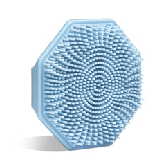 Sud Scrub antimicrobial face scrubber blue demonstrates gentle cleansing for clearer pores.