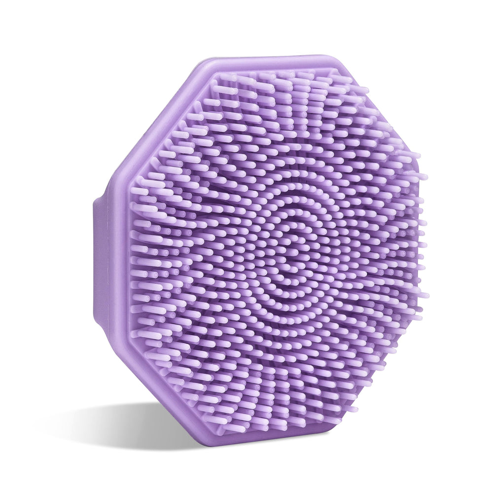 Sud Scrub antimicrobial silicone face scrubber purple closeup for gentle cleansing and odor resistance.