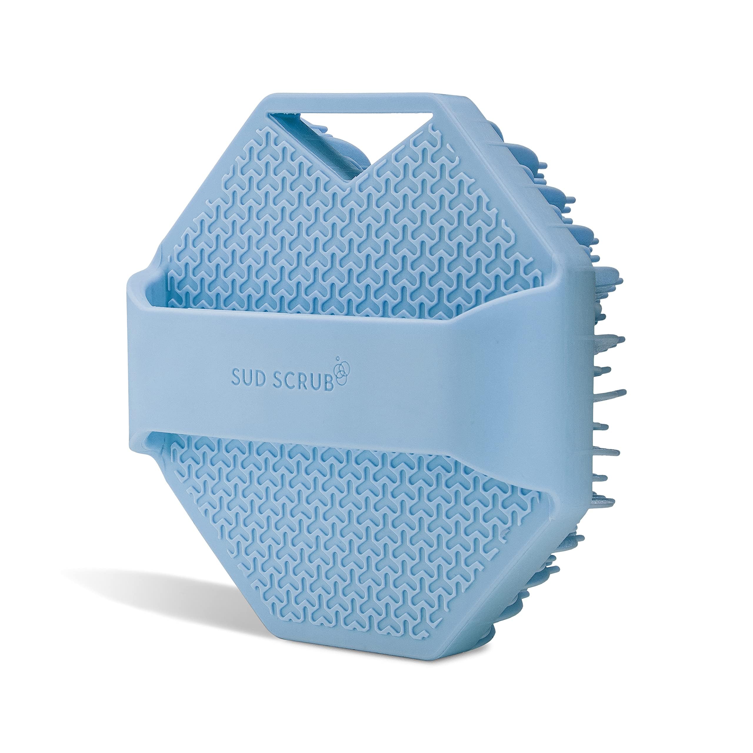 Sud Scrub blue body brush in use for quick exfoliation and cleansing