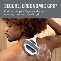 Sud Scrub Extender Handle held in hand for easy back access in shower