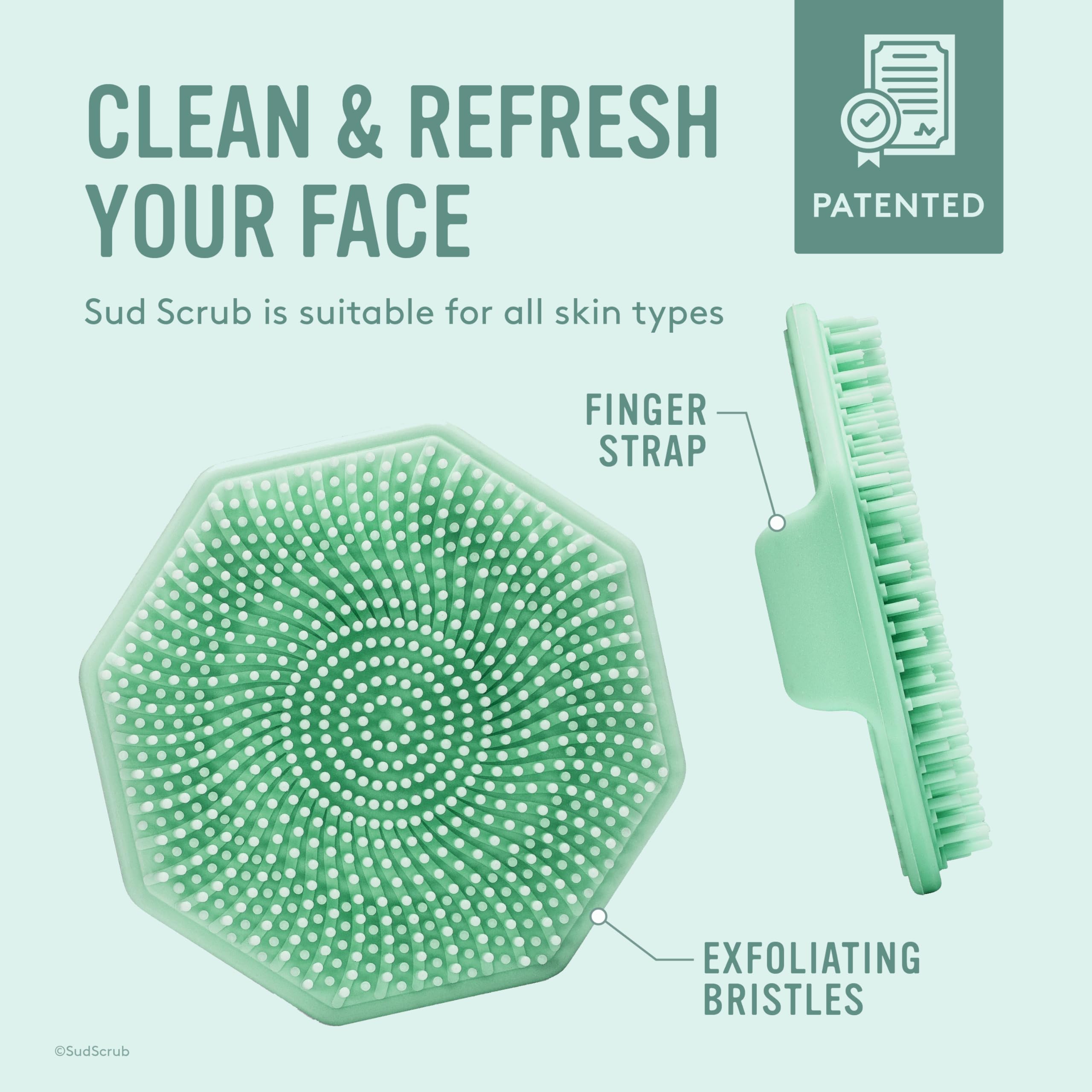 Sud Scrub mint non-slip grip with ergonomic finger strap for secure scrubbing.