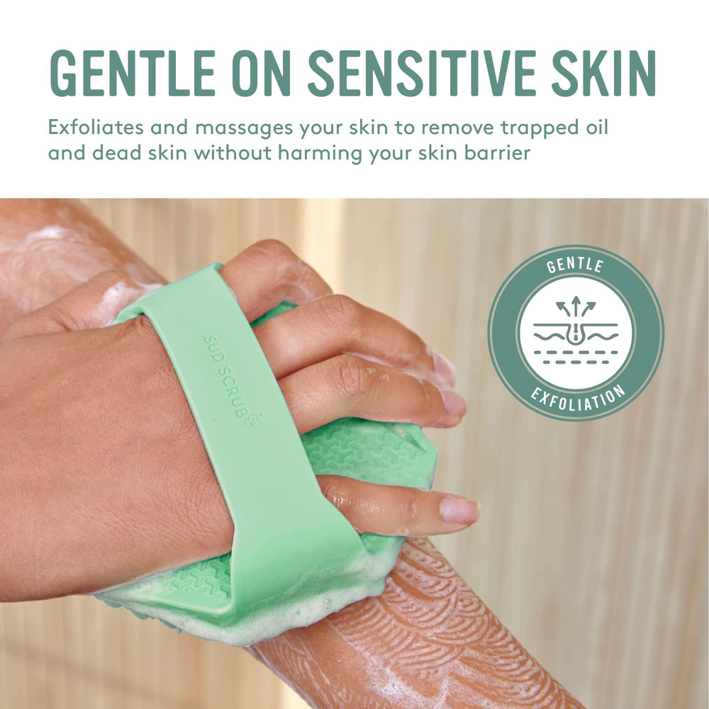 Sud Scrub non-slip grip demonstrates secure handling during showering.