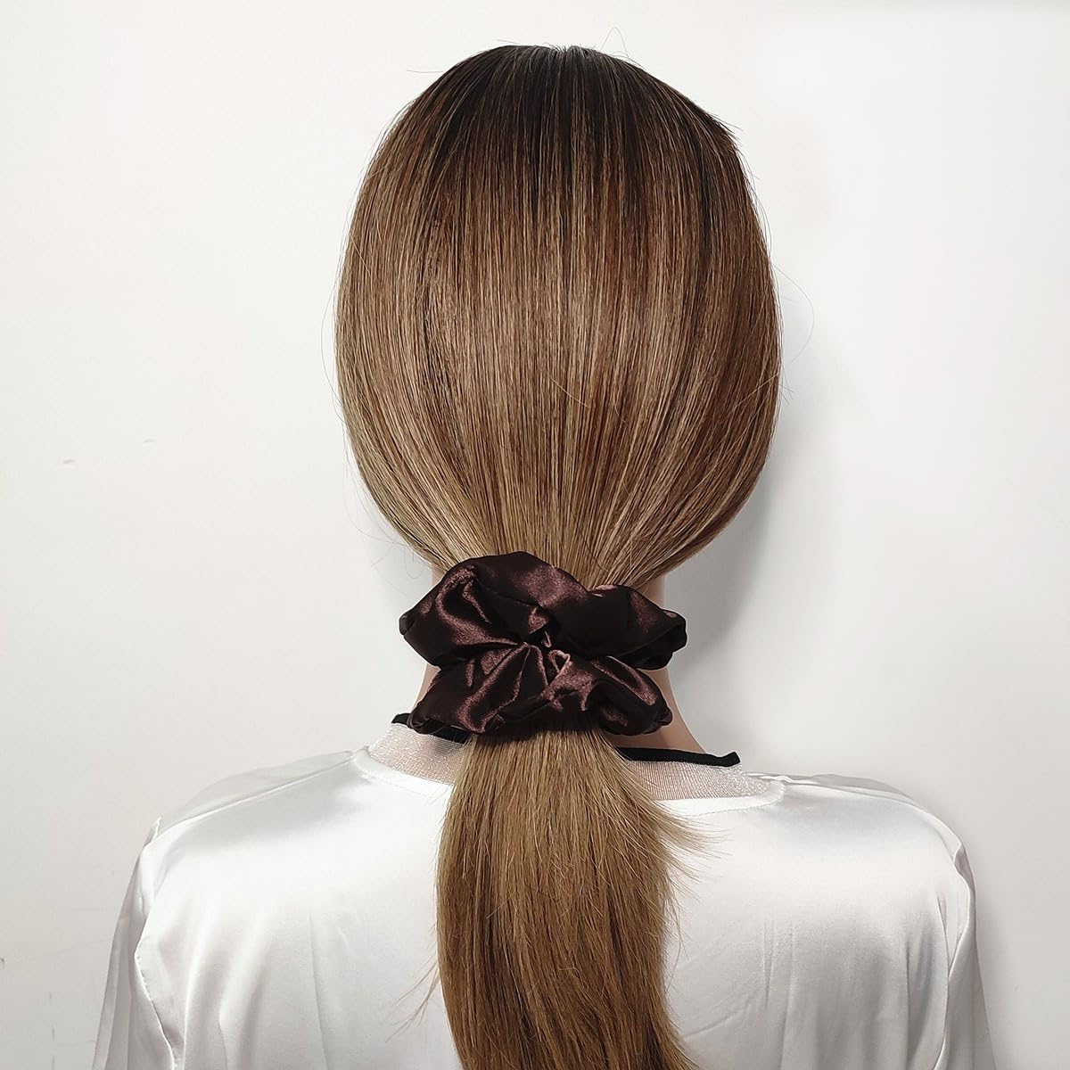 Sufermoe soft elastic satin scrunchie close-up highlighting smooth hold.