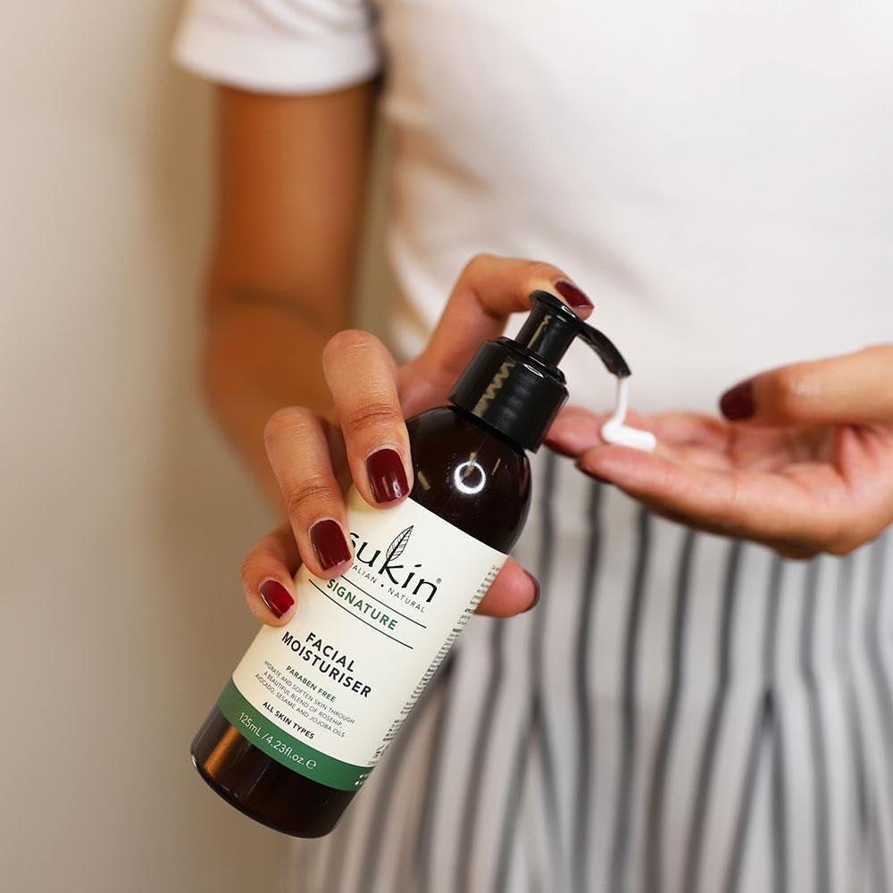 Sukin facial moisturizer close-up of rosehip and wheat germ ingredients for nourishment.