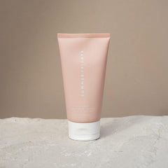 Summer Fridays Babymoon Belly Balm application demonstrates gentle, deep hydration for tired, stretched skin.