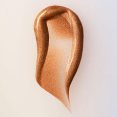 Summer Fridays Bronzing Drops swirl on skin for a natural sun-kissed glow.