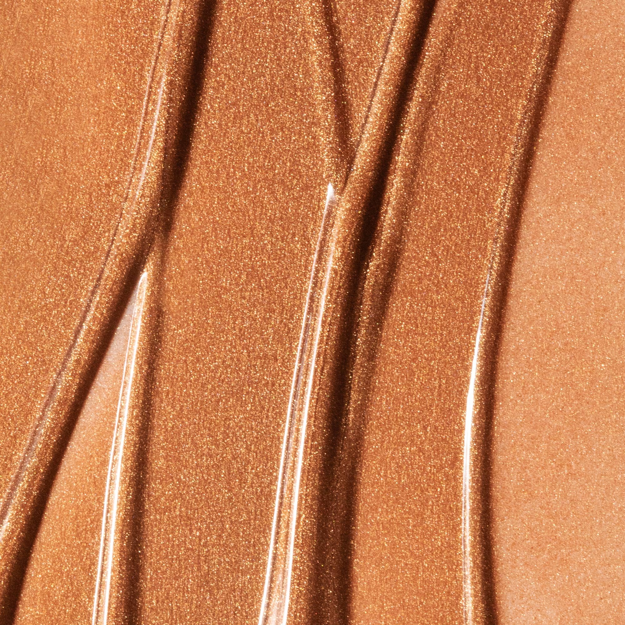 Summer Fridays Bronzing Drops tiger grass calms redness for comfort.
