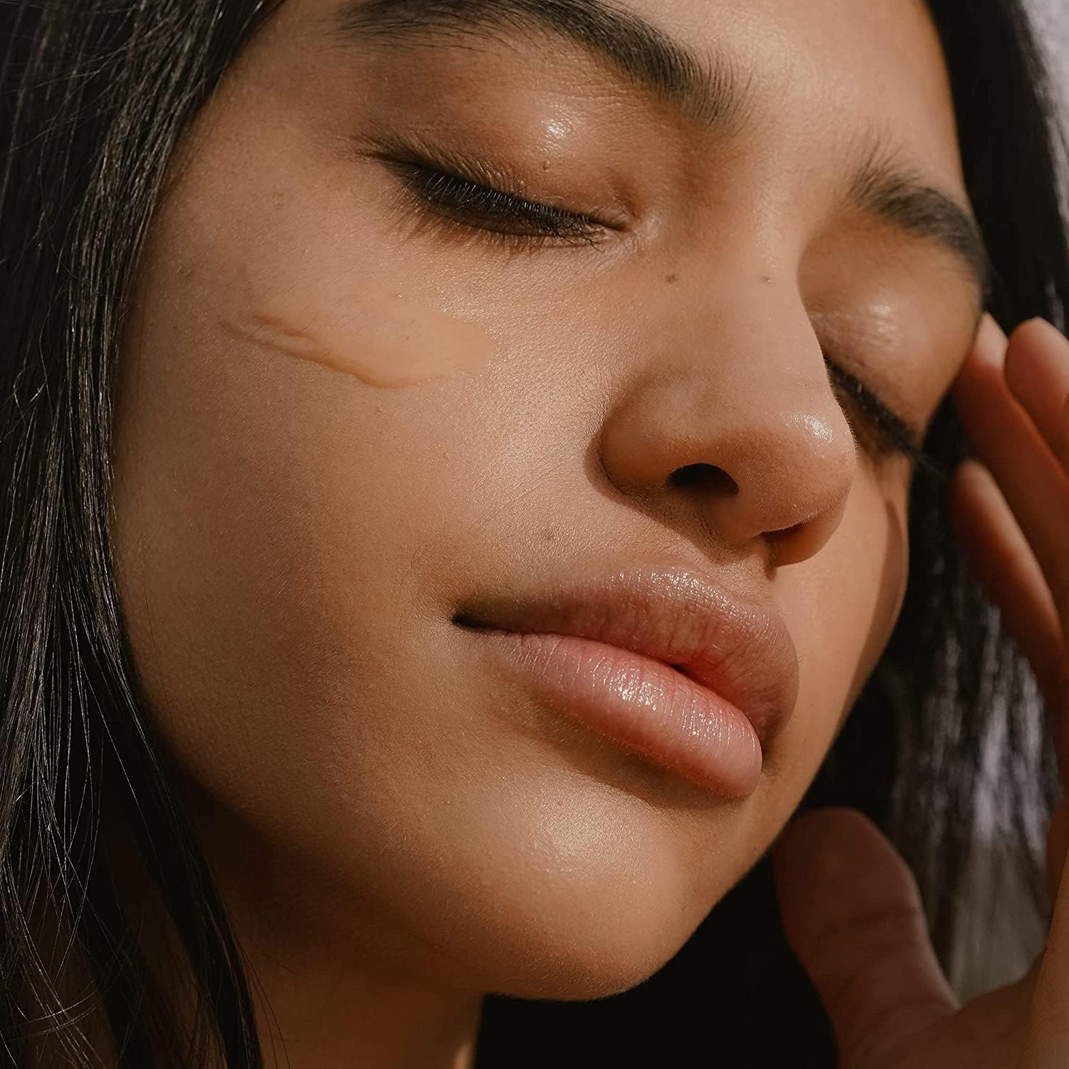 Summer Fridays CC Me Serum hand-application demonstrating lightweight texture.