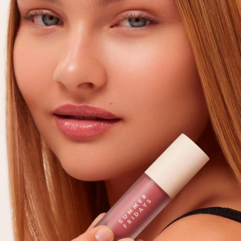 Summer Fridays Dream Lip Oil blush-dreams-tube shows the tinted shade on applicator