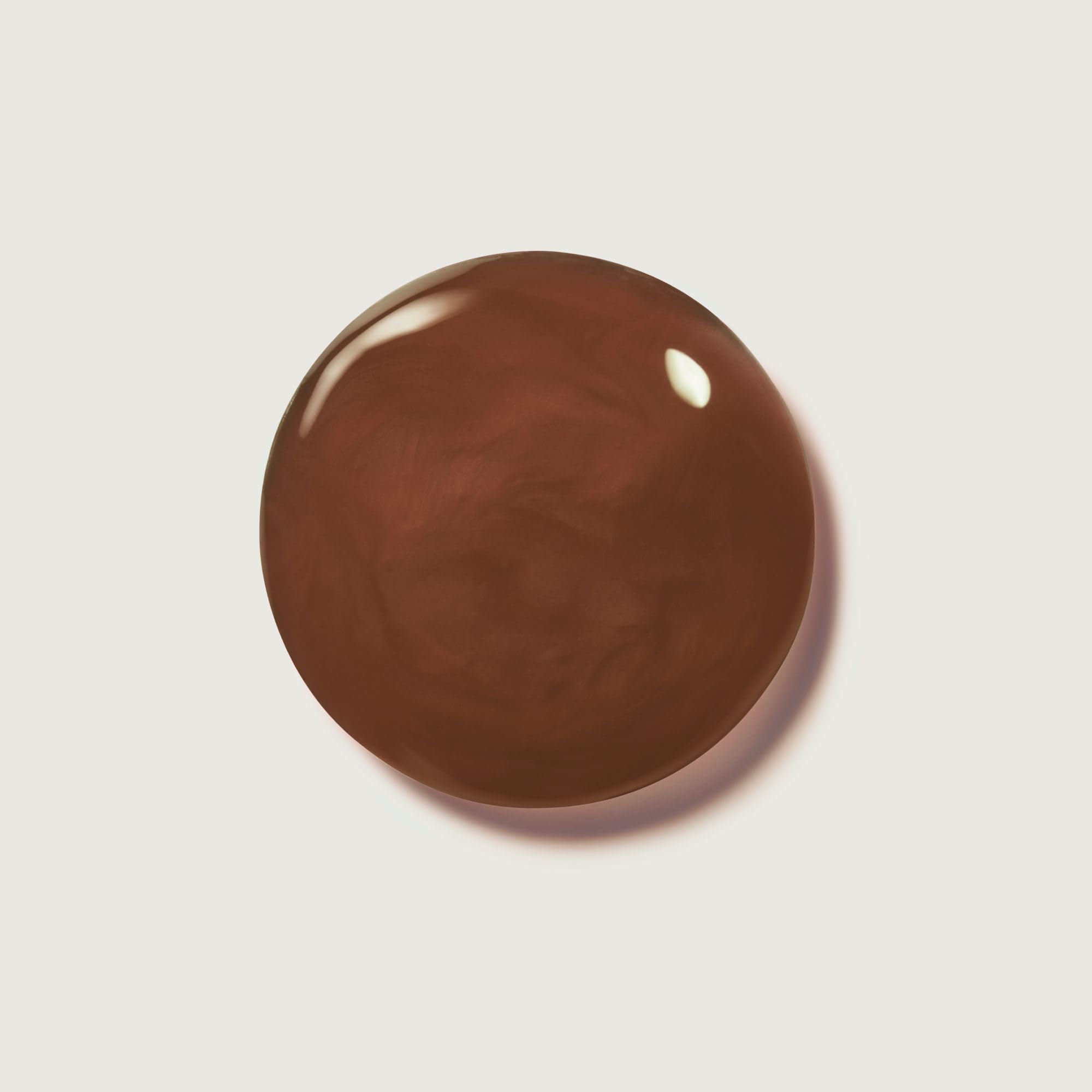 Summer Fridays hot cocoa swatch shows sheer warmth and subtle shine