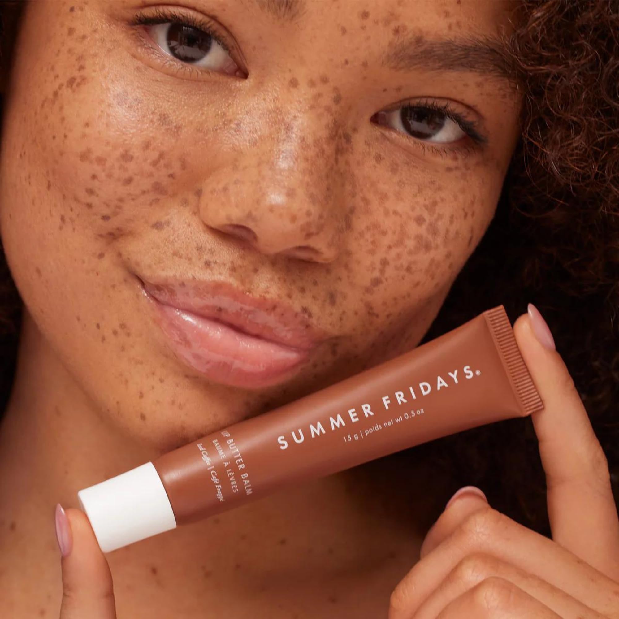 Summer Fridays Iced Coffee balm packaging close-up highlighting vegan formula.