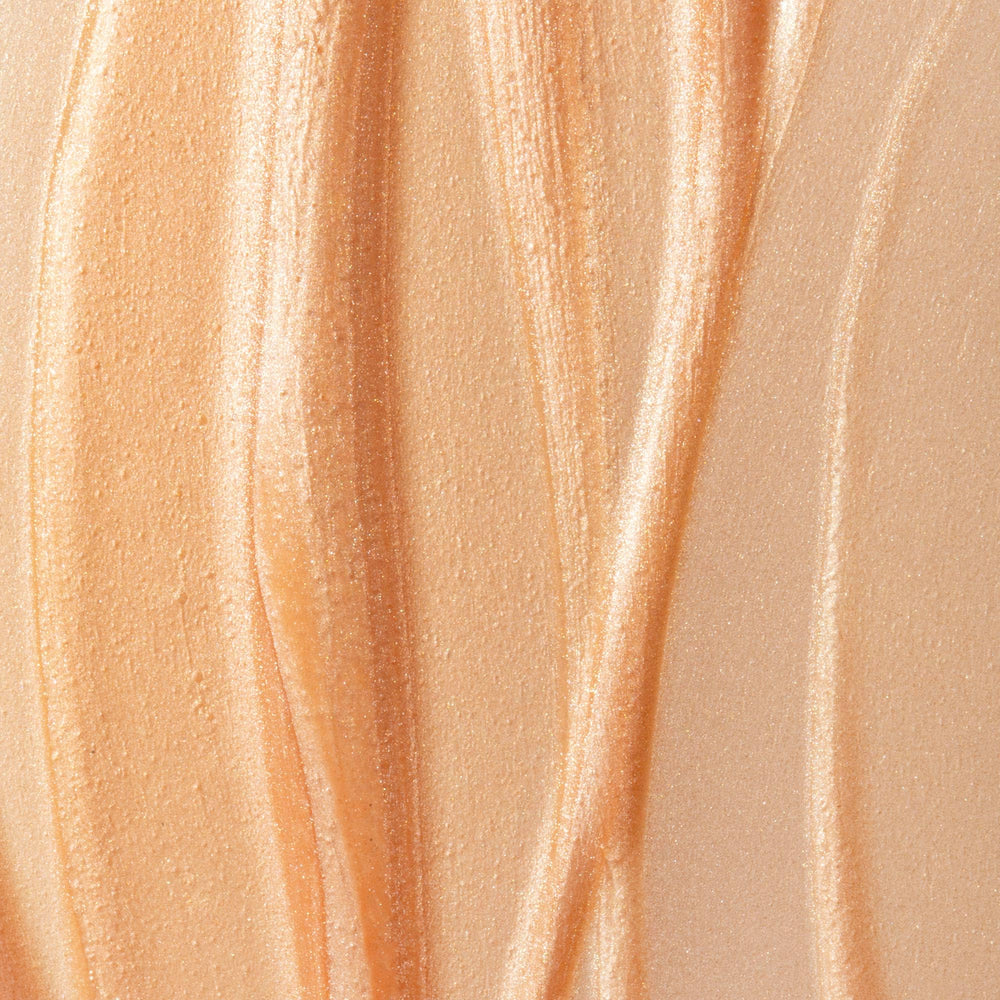 Summer Fridays Illuminating Drops beside skincare stack for daily ritual
