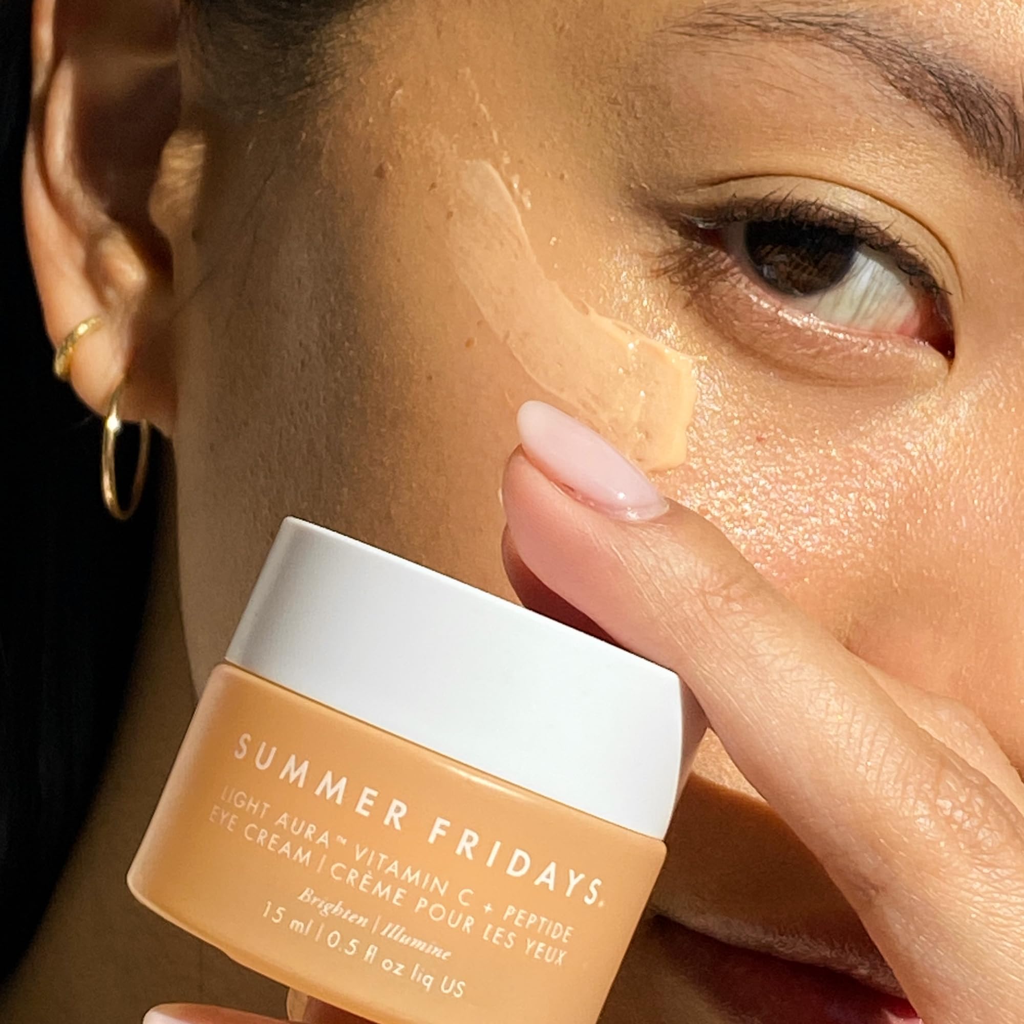 Summer Fridays Light Aura Eye Cream ingredients highlight Vitamin C and peptides for brightness.
