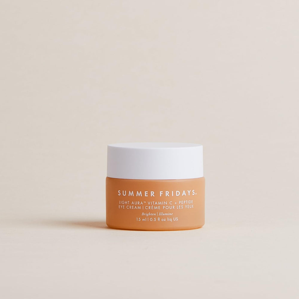 Summer Fridays Light Aura Eye Cream packaging emphasizes vitamin C and peptides.