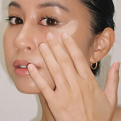 Summer Fridays Light Aura Eye Cream application dab showing hydrating under-eye glow.