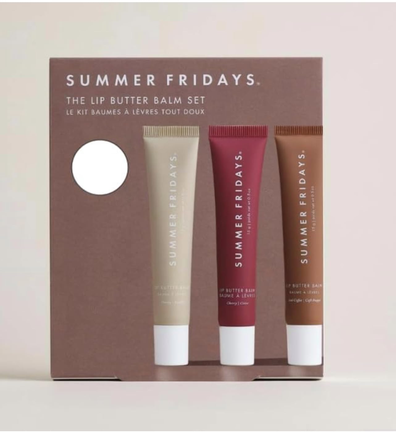 Summer Fridays lip butter balm trio image shows vanilla, vanilla beige, and brown sugar tubes for on-the-go hydration.