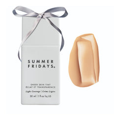 Summer Fridays Sheer Skin Tint bottle closeup showing lightweight hydration for a natural glow.