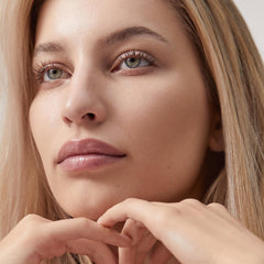 Summer Fridays Sheer Skin Tint hyaluronic acid glow close-up highlighting hydration.