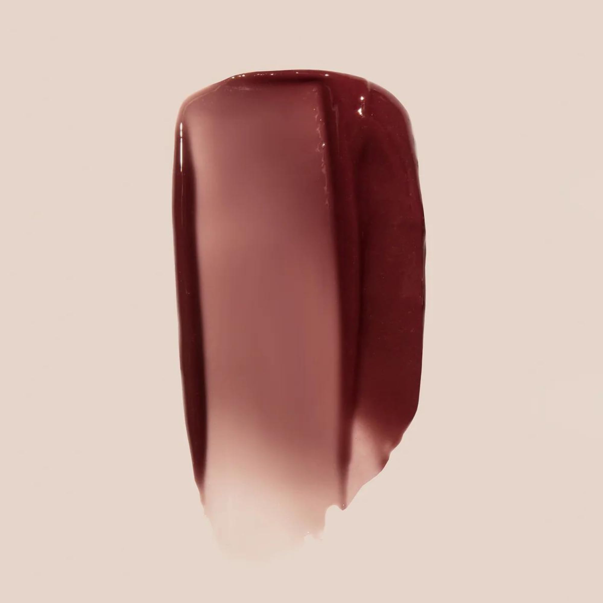 Summer Fridays tinted lip butter brown sugar application demonstrates smooth, non greasy hydration.