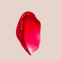Summer Fridays Lip Butter Cherry sheer color on lips with subtle shine.