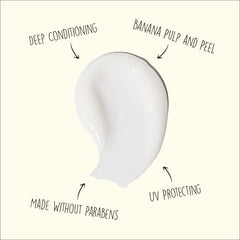 Sun Bum Revitalizing Deep Conditioning Hair Mask tube on sink shows creamy texture for nourishment.