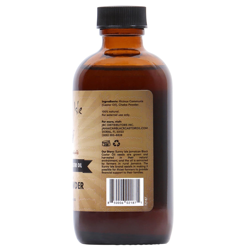 Sunny Isle Jamaican Black Castor Oil scalp application closeup.