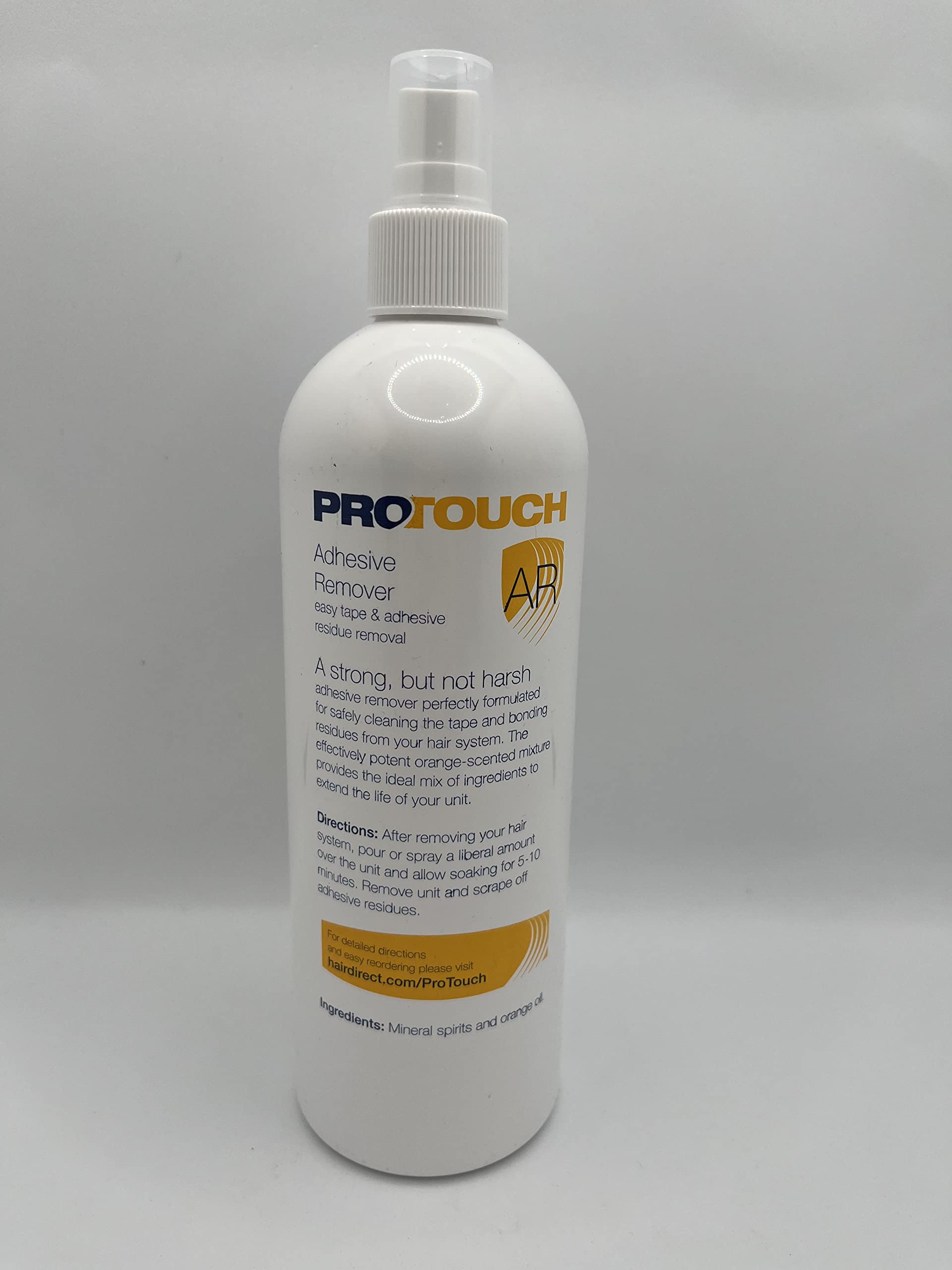 Sunshine Tape Pro Touch Adhesive Remover being applied to hairpiece for easy cleanup.