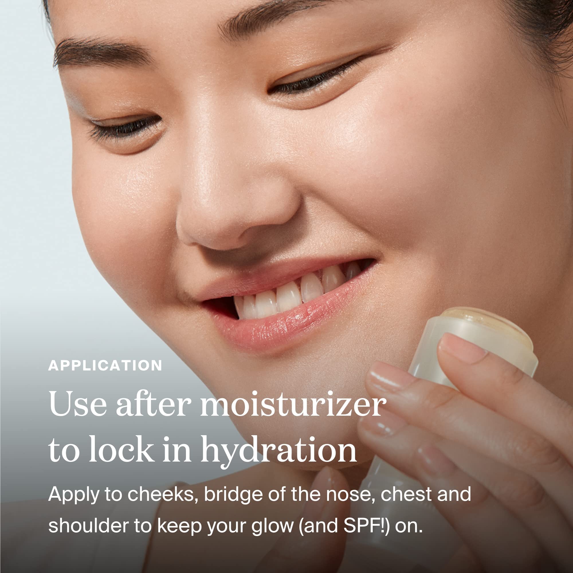 Compact Glow Stick in hand highlighting portable, travel-friendly sunscreen.