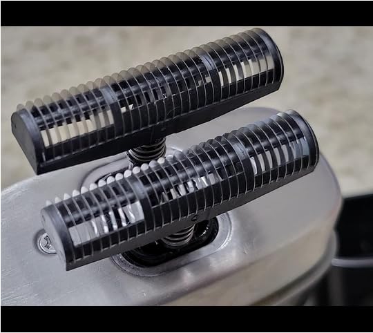 Supreme Trimmer precise-cut-performance shows close-up blade edge for sharp trimming.