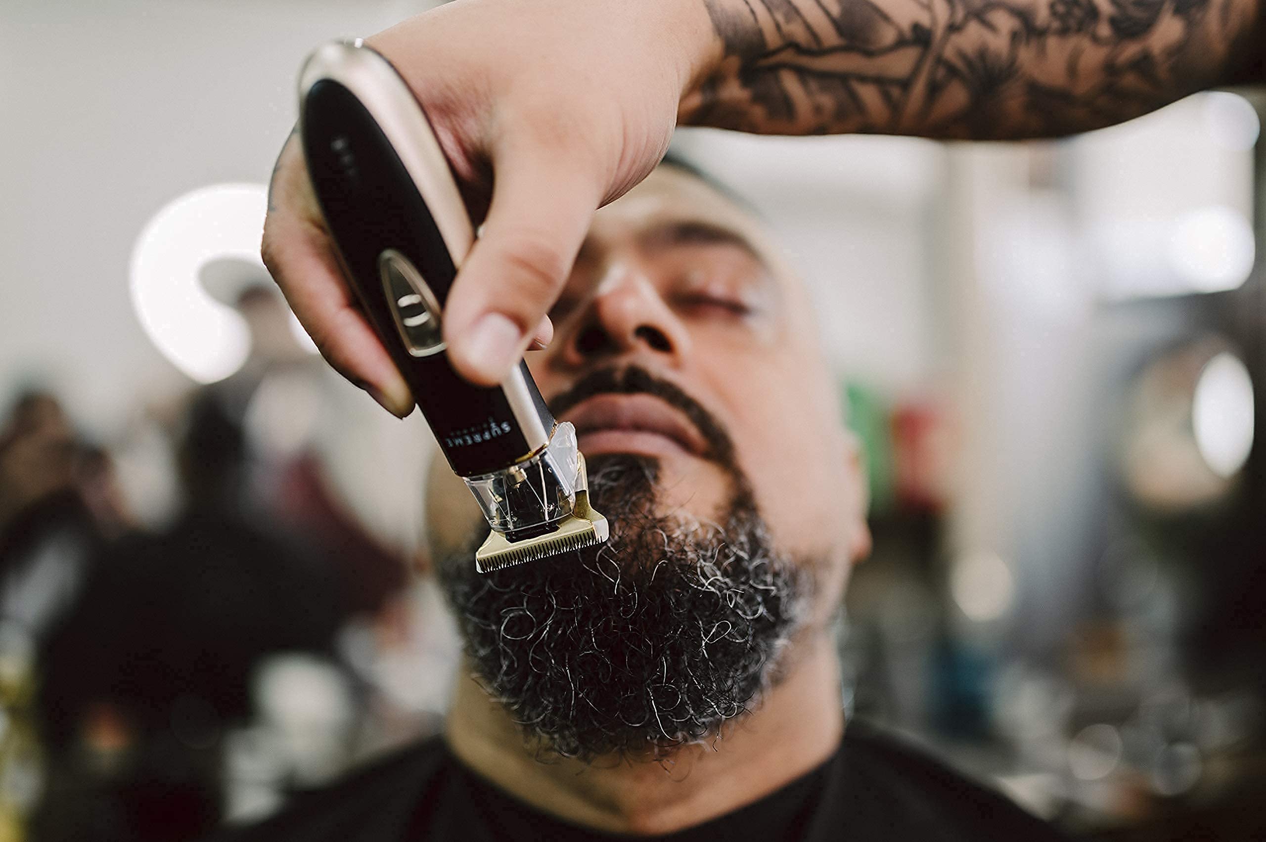 Supreme Trimmer includes guides, oil, charger and travel bag for grooming on the go.