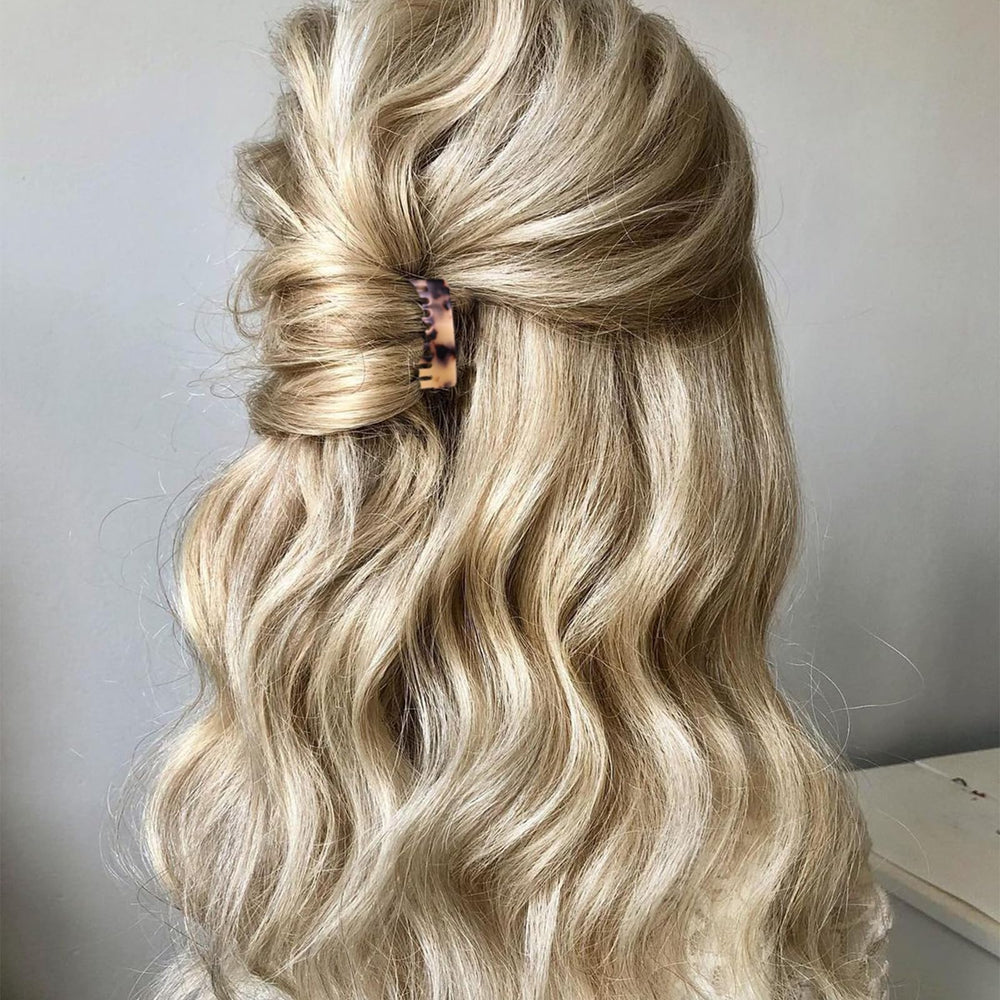 Suptizizkz model wearing French side combs for a polished half-up style.